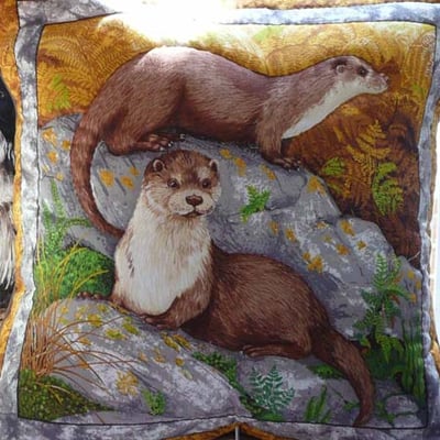 Coussin loutres