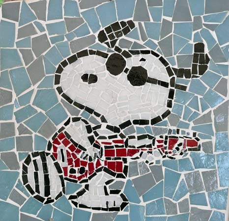 Snoopy à la guitare